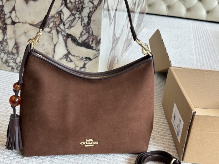 Coach Laurel Wander Bag: Dual-Strap Versatility With Zipped Side Pocket - Image 1