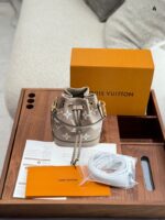 Louis Vuitton Nano Noe Mini Bucket Bag Classic Lv Pattern Adjustable Shoulder Strap Generous Capacity - Image 2