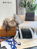 Louis Vuitton Express Handbag Structured Silhouette Versatile Carrying Options Generous Capacity Luxurious Leather