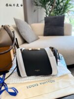 Louis Vuitton Express Handbag Structured Silhouette Versatile Carrying Options Generous Capacity Luxurious Leather - Image 2