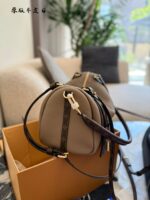 Louis Vuitton Express Handbag Structured Silhouette Versatile Carrying Options Generous Capacity Luxurious Leather - Image 5