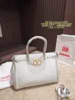 Valentino Tote Bag Distinctive Silhouette, Premium Texture, Essential Fashion Piece - Image 12