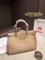 Valentino Tote Bag Distinctive Silhouette, Premium Texture, Essential Fashion Piece - Image 13