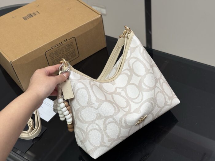 Coach Laurel Series Hobo Shoulder Bag Dual Straps For Versatile Carrying Zipped Side Pocket Included - Image 2