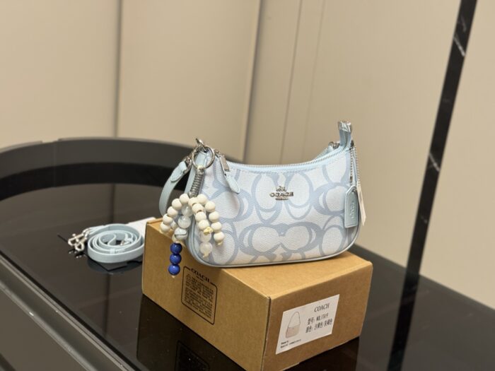 Coach Teri Underarm Bag With Dual Straps For Single-Shoulder Or Crossbody Carry. Exceptional Aesthetic Appeal. - Image 1