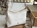 Coach New Laurel Wander Bag Dual-Strap Versatile Carrying Options Complete With Box And Pendant Internal Zipped Side Pocket