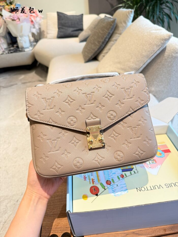 Louis Vuitton Pochette Metis Handbag Embossed Monogram Empreinte Leather S-Lock Clasp Can Be Carried Over The Shoulder Or Crossbody - Image 1