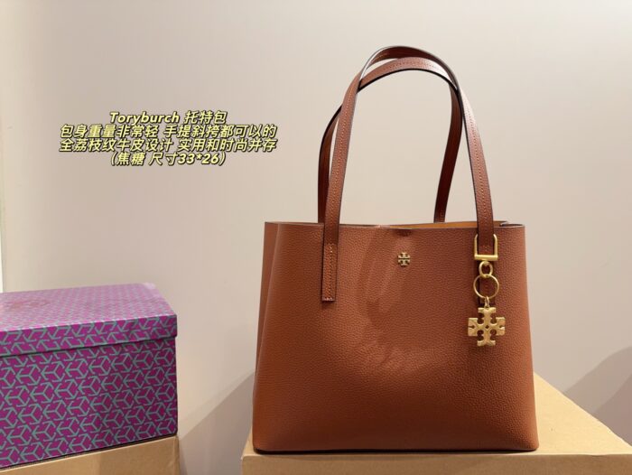 Tory Burch Full Grained Leather Tote Bag Carry By Hand Or Crossbody Lightweight, Practical, And Fashionable - Image 1
