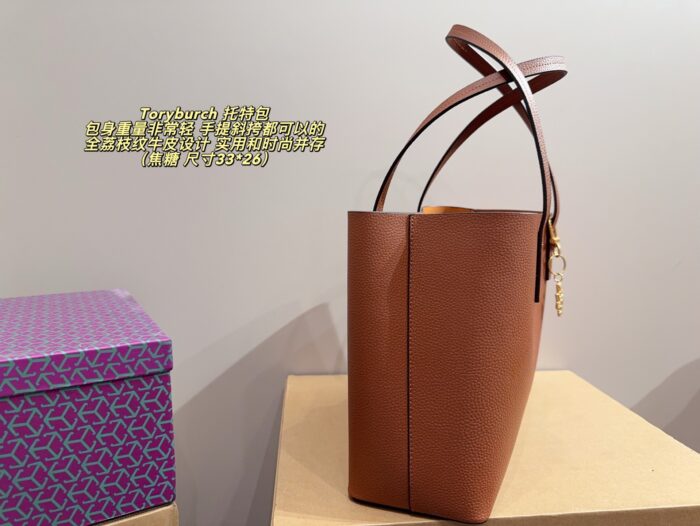 Tory Burch Full Grained Leather Tote Bag Carry By Hand Or Crossbody Lightweight, Practical, And Fashionable - Image 4