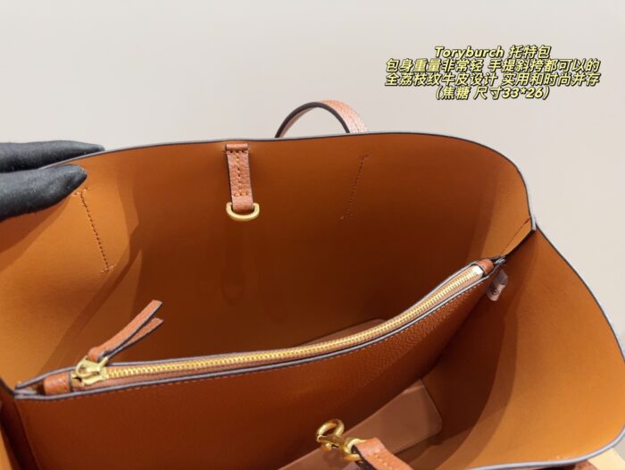 Tory Burch Full Grained Leather Tote Bag Carry By Hand Or Crossbody Lightweight, Practical, And Fashionable - Image 6