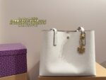 Tory Burch Full Grained Leather Tote Bag Carry By Hand Or Crossbody Lightweight, Practical, And Fashionable - Image 15