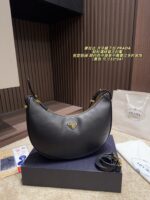 Prada Crescent Underarm Bag Retro Chic, Structured, Minimalist, Sophisticated