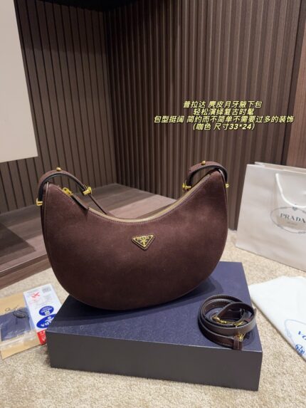 Prada Suede Crescent Underarm Bag Retro Chic Structured Silhouette Minimalist Design