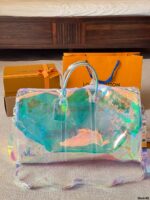 Louis Vuitton Keepall Glittering Laser-Effect Travel Bag Spacious, Practical, And Makes A Statement.