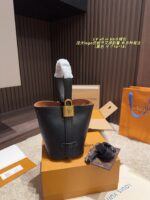 Louis Vuitton All In Bb Bucket Bag Versatile Carrying Options, Spacious Interior, And Refined Details - Image 2