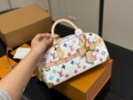 Louis Vuitton Hangon Bowling Bag: Compact Yet Spacious. - Image 2
