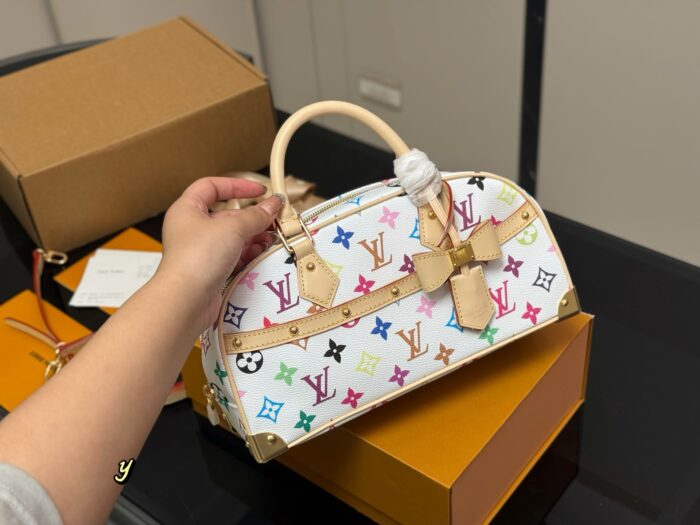Louis Vuitton Hangon Bowling Bag: Compact Yet Spacious. - Image 2
