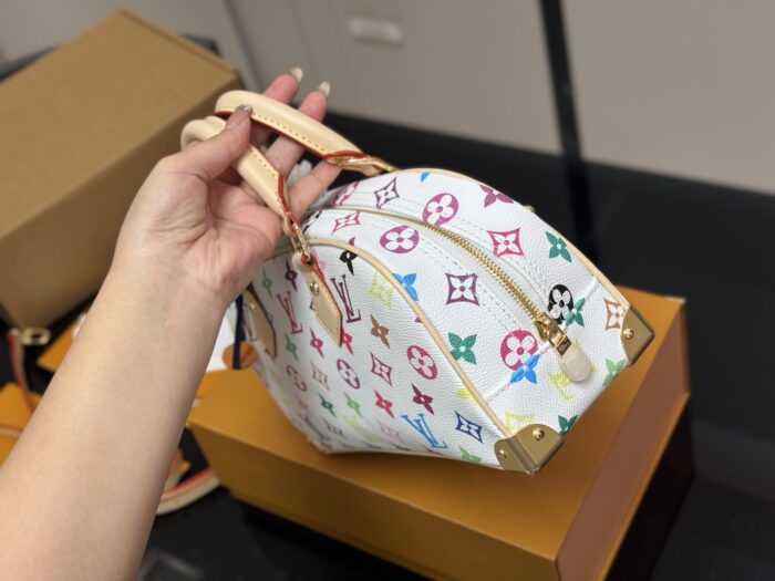 Louis Vuitton Hangon Bowling Bag: Compact Yet Spacious. - Image 7