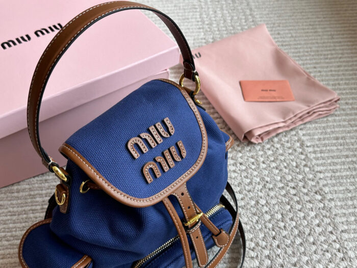 Miu Miu Blue And Brown Leather Drawstring Backpack Multi-Pocket Design For Practicality - Image 2