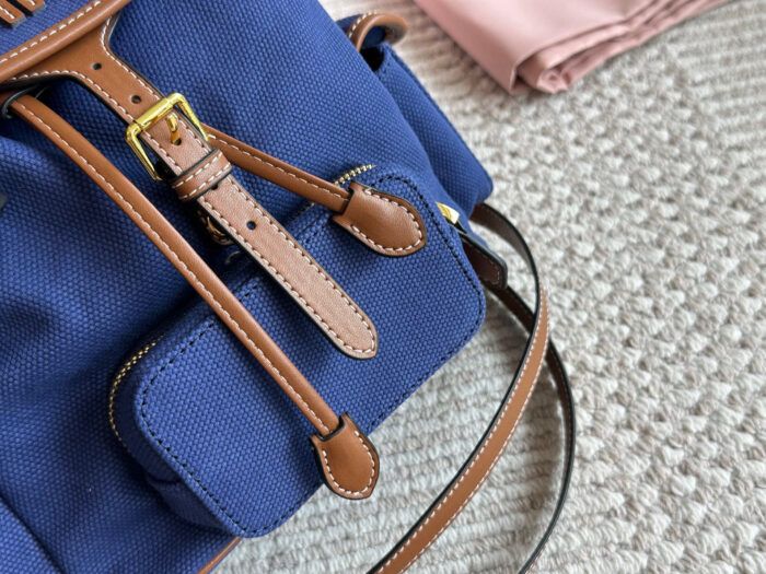 Miu Miu Blue And Brown Leather Drawstring Backpack Multi-Pocket Design For Practicality - Image 3