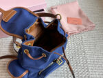 Miu Miu Blue And Brown Leather Drawstring Backpack Multi-Pocket Design For Practicality - Image 9