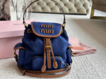Miu Miu Blue And Brown Leather Drawstring Backpack Multi-Pocket Design For Practicality - Image 10