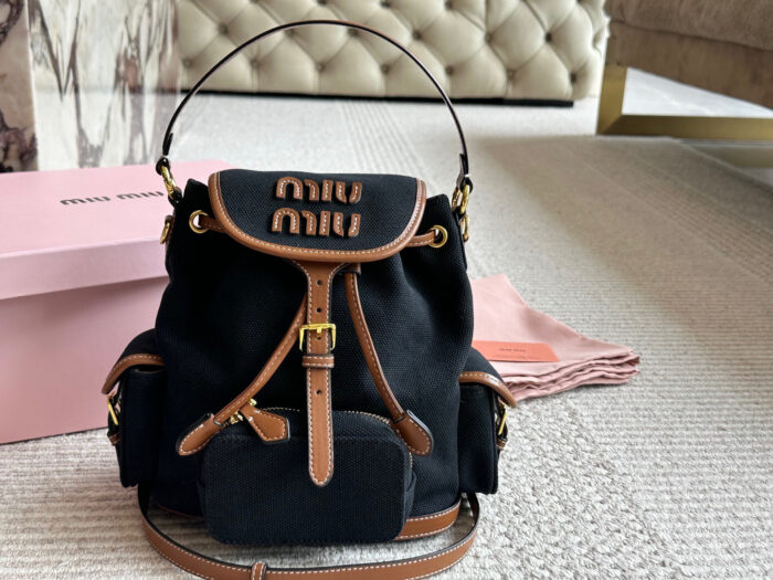 Miu Miu Blue And Brown Leather Drawstring Backpack Multi-Pocket Design For Practicality - Image 13