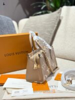 Louis Vuitton On The Go Horizontal Small Handbag - Elephant Grey - Spacious Yet Refined Design - Image 3