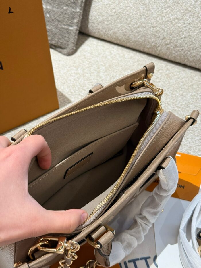 Louis Vuitton On The Go Horizontal Small Handbag - Elephant Grey - Spacious Yet Refined Design - Image 7