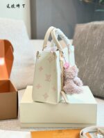 Louis Vuitton Onthego Collection May New Release: Cream Strawberry Tote Bag Classic Silhouette With Integrated Charm Carry By Hand, Shoulder Or Crossbody - Image 3