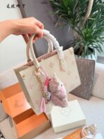 Louis Vuitton Onthego Collection May New Release: Cream Strawberry Tote Bag Classic Silhouette With Integrated Charm Carry By Hand, Shoulder Or Crossbody - Image 8
