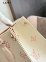Louis Vuitton Onthego Collection May New Release: Cream Strawberry Tote Bag Classic Silhouette With Integrated Charm Carry By Hand, Shoulder Or Crossbody - Image 9