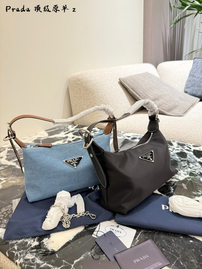 Prada Nylon Dumpling Bag Charming Silhouette Leather-Reinforced Corners Spacious And Versatile - Image 1