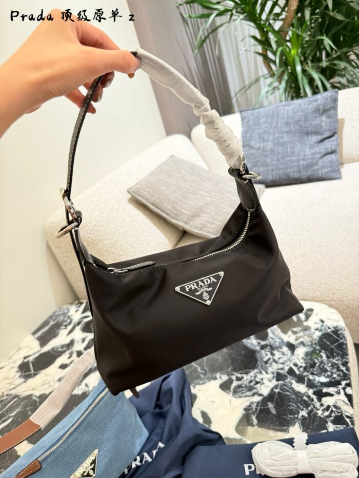 Prada Nylon Dumpling Bag Charming Silhouette Leather-Reinforced Corners Spacious And Versatile - Image 2