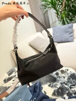 Prada Nylon Dumpling Bag Charming Silhouette Leather-Reinforced Corners Spacious And Versatile - Image 3