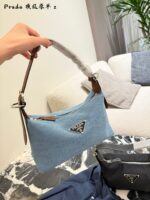 Prada Nylon Dumpling Bag Charming Silhouette Leather-Reinforced Corners Spacious And Versatile - Image 5