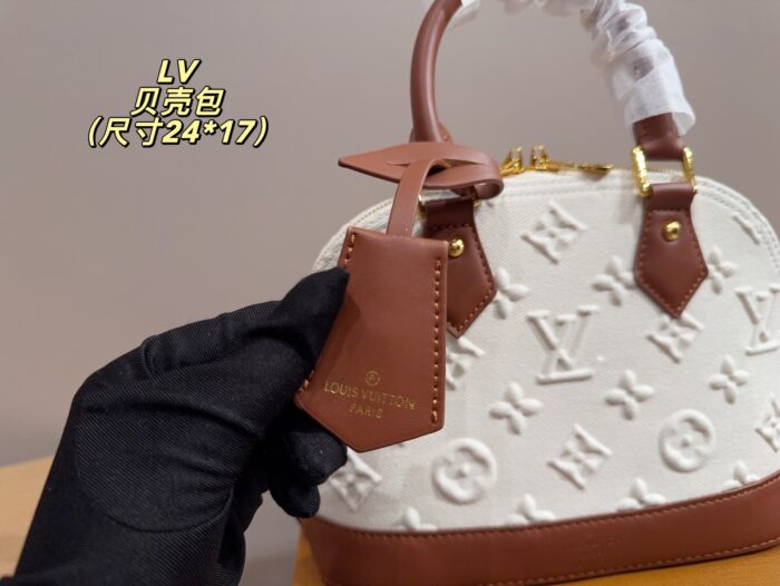Louis Vuitton Shell Bag Sweet Yet Edgy, Versatile And Stylish Highly Fashionable And Visually Striking A Must-Have For Every Trendy Girl - Image 4
