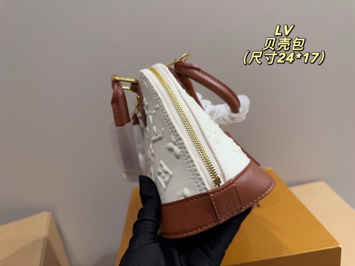 Louis Vuitton Shell Bag Sweet Yet Edgy, Versatile And Stylish Highly Fashionable And Visually Striking A Must-Have For Every Trendy Girl - Image 5