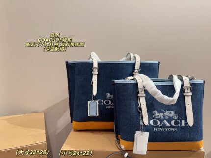 Coach Tote Bag Deep Blue With Orange Accents Luxurious And Elegant Versatile For Multiple Occasions