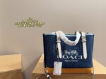 Coach Tote Bag Deep Blue With Orange Accents Luxurious And Elegant Versatile For Multiple Occasions - Image 2