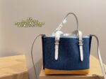 Coach Tote Bag Deep Blue With Orange Accents Luxurious And Elegant Versatile For Multiple Occasions - Image 3