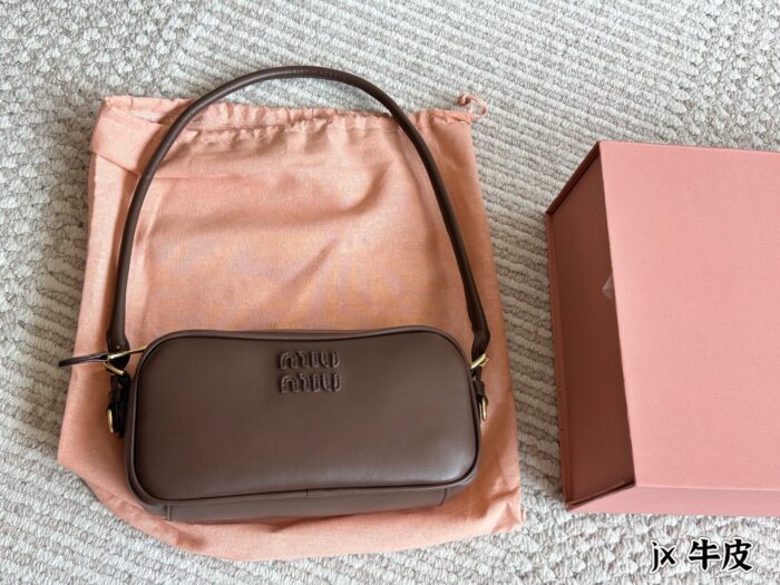 Miu Miu Cowhide Bowling Bag Handbag - Image 1
