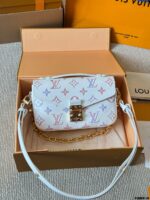Louis Vuitton Pochette Metis East West Mini Monogram Messenger Bag | Handheld, Shoulder, Crossbody | Gold-Tone Hardware | Adjustable Shoulder Strap | Zip Closure | Gift Box Included - Image 6
