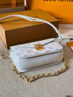 Louis Vuitton Pochette Metis East West Mini Monogram Messenger Bag | Handheld, Shoulder, Crossbody | Gold-Tone Hardware | Adjustable Shoulder Strap | Zip Closure | Gift Box Included - Image 8