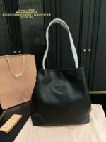 Miu Miu Single Strap Tote Bag Black Leather Curved Or Straight Handle Single Shoulder Strap Generous Capacity - Image 4