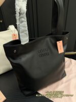 Miu Miu Double Strap Tote Bag Black Leather Curved Or Straight Handle Elegant When Worn Over The Shoulder Generous Capacity - Image 2