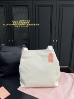 Miu Miu Double Strap Tote Bag Black Leather Curved Or Straight Handle Elegant When Worn Over The Shoulder Generous Capacity - Image 12