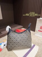 Tory Burch Hobo Horn Bag Multi-Pocket Design With Generous Capacity Commute, Date, Travel Bag - Image 13