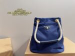 Prada Nylon Bucket Bag Spacious And Ultra-Lightweight For Commuting Metal Rings On Both Sides For Attaching Charms - Image 2