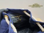 Prada Nylon Bucket Bag Spacious And Ultra-Lightweight For Commuting Metal Rings On Both Sides For Attaching Charms - Image 7